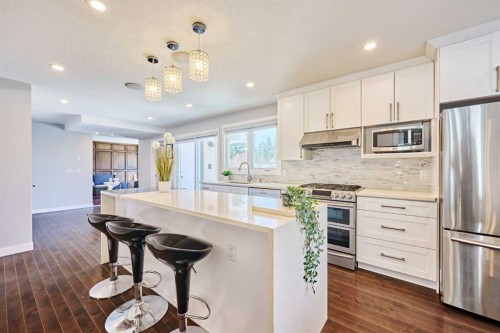 103 Pump Hill Road, Calgary, AB - Indoor Photo Showing Kitchen With Stainless Steel Kitchen With Upgraded Kitchen