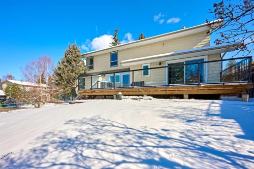 103 Pump Hill Road, Calgary, AB - Outdoor With Deck Patio Veranda