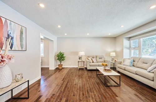103 Pump Hill Road, Calgary, AB - Indoor Photo Showing Living Room