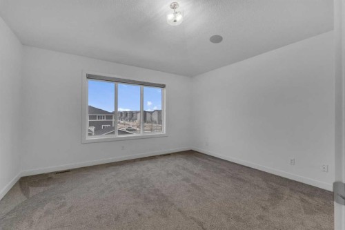 9 Redstone Common Ne, Calgary, AB - Indoor Photo Showing Other Room