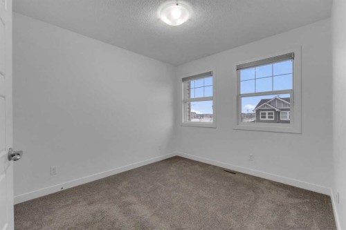 9 Redstone Common Ne, Calgary, AB - Indoor Photo Showing Other Room