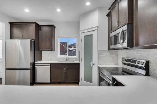 9 Redstone Common Ne, Calgary, AB - Indoor Photo Showing Kitchen With Stainless Steel Kitchen With Upgraded Kitchen
