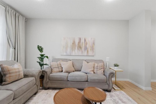 34 Lavender Manor Se, Calgary, AB - Indoor Photo Showing Living Room