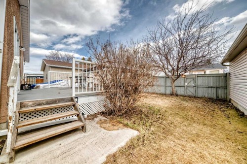 7165 California Boulevard Ne, Calgary, AB - Outdoor With Deck Patio Veranda
