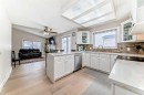 7165 California Boulevard Ne, Calgary, AB  - Indoor Photo Showing Kitchen With Double Sink 