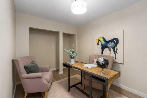 487 Arlington Drive Se, Calgary, AB - Indoor Photo Showing Living Room With Fireplace