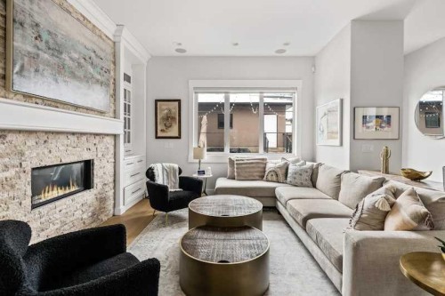 3917 16 Street Sw, Calgary, AB - Indoor Photo Showing Living Room With Fireplace