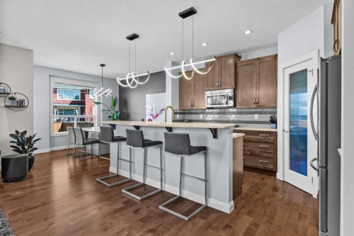 100 Kinniburgh Gardens, Chestermere, AB - Indoor Photo Showing Kitchen With Upgraded Kitchen