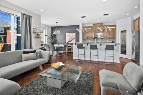 100 Kinniburgh Gardens, Chestermere, AB - Indoor Photo Showing Living Room