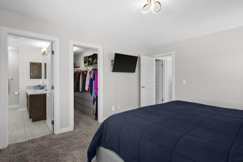 100 Kinniburgh Gardens, Chestermere, AB - Indoor Photo Showing Bedroom