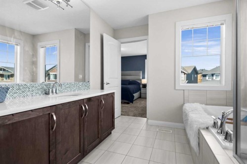 100 Kinniburgh Gardens, Chestermere, AB - Indoor Photo Showing Bathroom