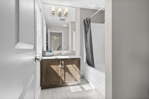 100 Kinniburgh Gardens, Chestermere, AB - Indoor Photo Showing Bathroom