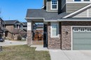 100 Kinniburgh Gardens, Chestermere, AB  - Outdoor With Facade 