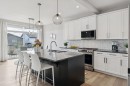 363 Precedence Hill, Cochrane, AB  - Indoor Photo Showing Kitchen With Upgraded Kitchen 