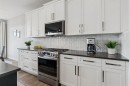 363 Precedence Hill, Cochrane, AB  - Indoor Photo Showing Kitchen With Upgraded Kitchen 