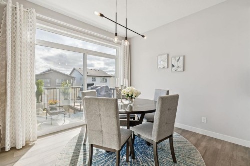 363 Precedence Hill, Cochrane, AB - Indoor Photo Showing Dining Room