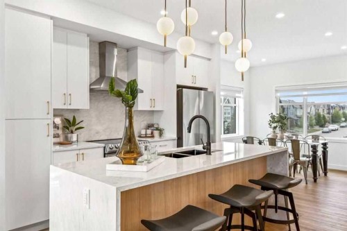 603-200 Belvedre Boulevard Se, Calgary, AB - Indoor Photo Showing Kitchen With Double Sink With Upgraded Kitchen