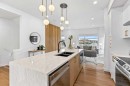 603-200 Belvedre Boulevard Se, Calgary, AB  - Indoor Photo Showing Kitchen With Double Sink With Upgraded Kitchen 