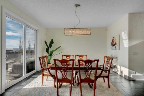 287 Sunset View, Cochrane, AB - Indoor Photo Showing Dining Room