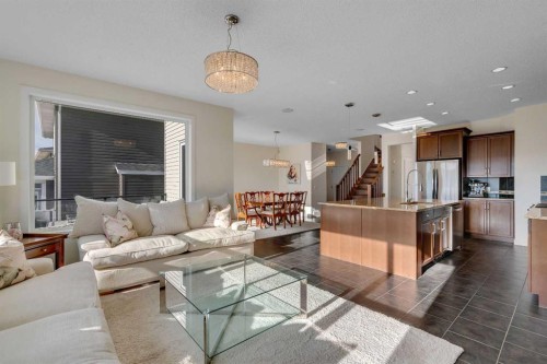 287 Sunset View, Cochrane, AB - Indoor Photo Showing Living Room