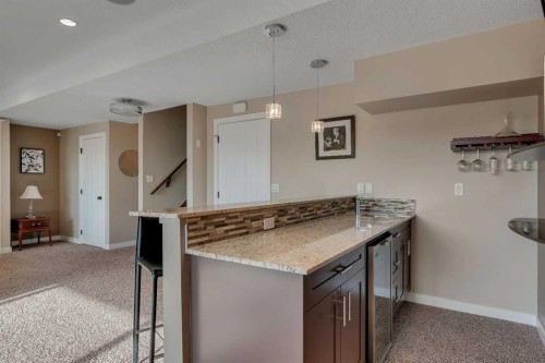 287 Sunset View, Cochrane, AB - Indoor Photo Showing Kitchen