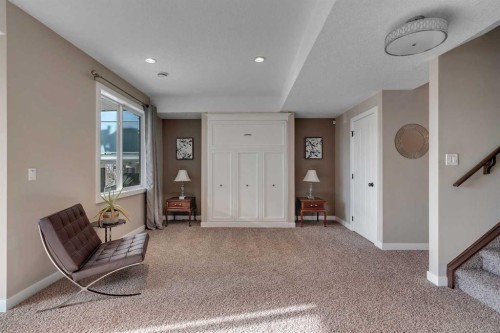 287 Sunset View, Cochrane, AB - Indoor Photo Showing Other Room