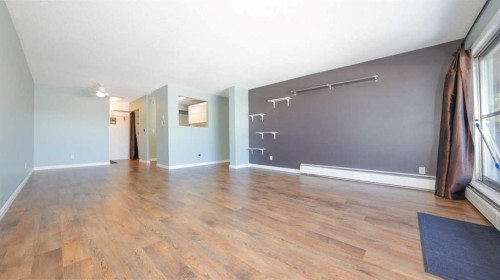35B-231 Heritage Drive Se, Calgary, AB - Indoor Photo Showing Other Room