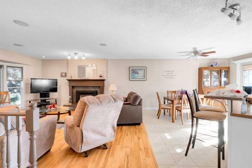 51 Bermondsey Place Nw, Calgary, AB - Indoor With Fireplace
