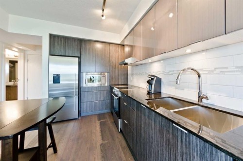 1704-930 6 Avenue Sw, Calgary, AB - Indoor Photo Showing Kitchen With Double Sink With Upgraded Kitchen