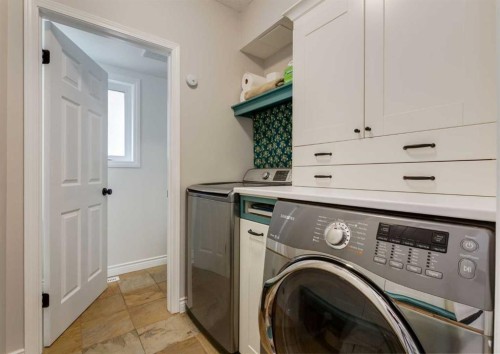 109 Sundown Place Se, Calgary, AB - Indoor Photo Showing Laundry Room