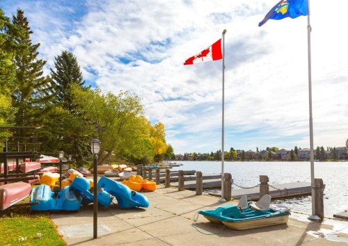 109 Sundown Place Se, Calgary, AB - Outdoor With Body Of Water With Deck Patio Veranda With View