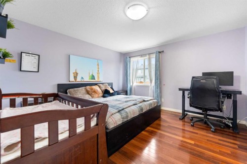 72 Panamount Heights Nw, Calgary, AB - Indoor Photo Showing Bedroom