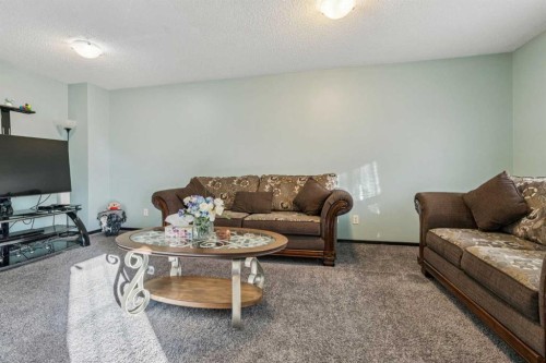110 Eversyde Common Sw, Calgary, AB - Indoor Photo Showing Living Room