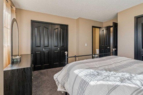 110 Eversyde Common Sw, Calgary, AB - Indoor Photo Showing Bedroom