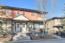 110 Eversyde Common Sw, Calgary, AB  - Outdoor With Deck Patio Veranda With Facade 