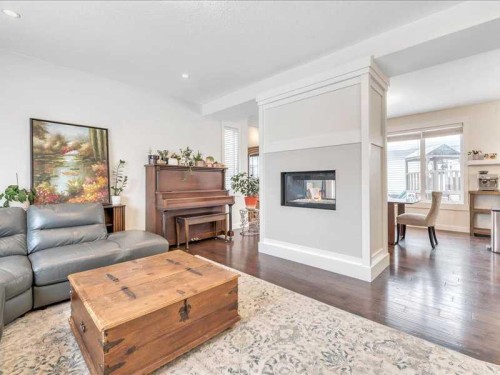 201 Rainbow Falls Glen, Chestermere, AB - Indoor Photo Showing Living Room With Fireplace