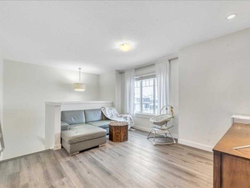 201 Rainbow Falls Glen, Chestermere, AB - Indoor Photo Showing Living Room