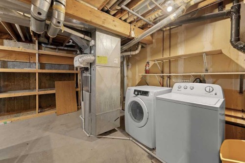56-5520 1 Avenue Se, Calgary, AB - Indoor Photo Showing Laundry Room
