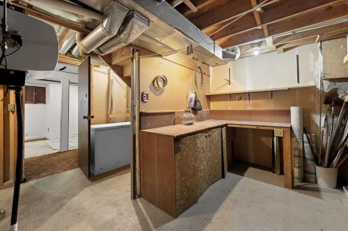 56-5520 1 Avenue Se, Calgary, AB - Indoor Photo Showing Basement