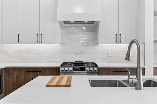 2012 37 Avenue Sw, Calgary, AB - Indoor Photo Showing Kitchen With Double Sink With Upgraded Kitchen