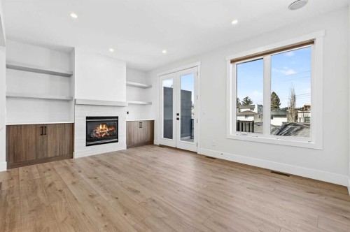 2012 37 Avenue Sw, Calgary, AB - Indoor Photo Showing Other Room With Fireplace