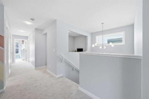 320 Sundown View, Cochrane, AB - Indoor Photo Showing Other Room