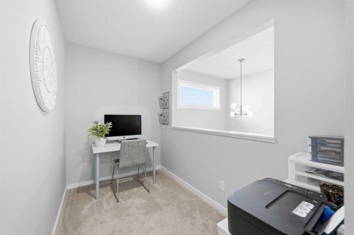 320 Sundown View, Cochrane, AB - Indoor Photo Showing Other Room