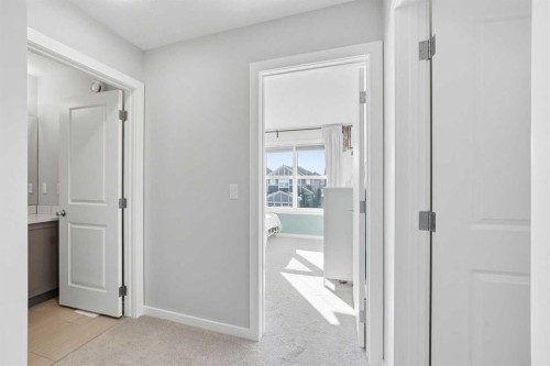 320 Sundown View, Cochrane, AB - Indoor Photo Showing Other Room