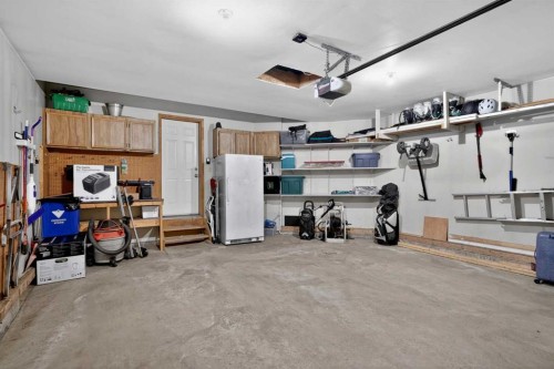 81 Riverwood Crescent Se, Calgary, AB - Indoor Photo Showing Garage