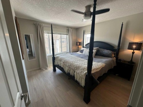 113 Copperpond Row Se, Calgary, AB - Indoor Photo Showing Bedroom