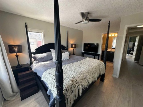 113 Copperpond Row Se, Calgary, AB - Indoor Photo Showing Bedroom