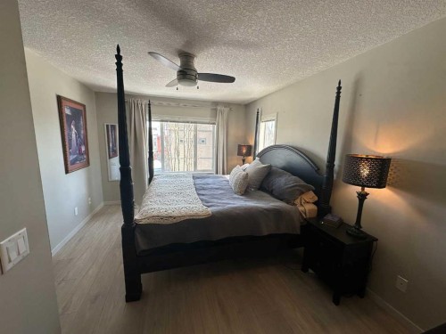 113 Copperpond Row Se, Calgary, AB - Indoor Photo Showing Bedroom