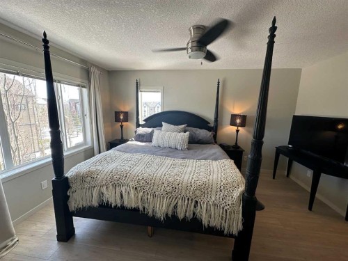 113 Copperpond Row Se, Calgary, AB - Indoor Photo Showing Bedroom