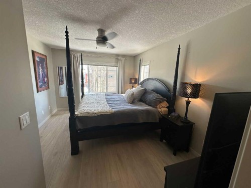 113 Copperpond Row Se, Calgary, AB - Indoor Photo Showing Bedroom